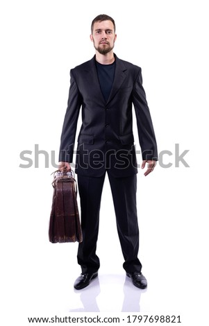 Bearded man in a business suit on a white background. Business style.