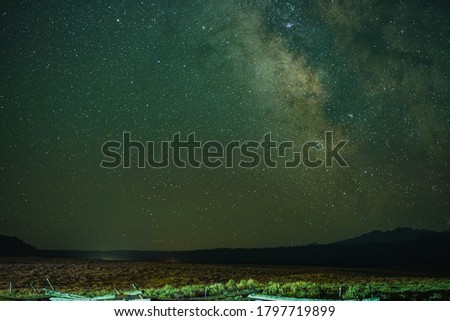 Landscape with mountains at night with stars in the sky - Stanley Idaho