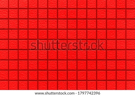 Red mosaic wall tile pattern and seamless background