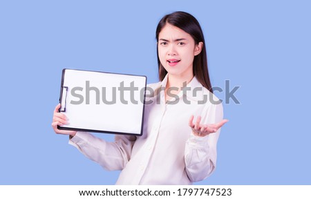Portrait of an Asian woman holding a white board for business writing