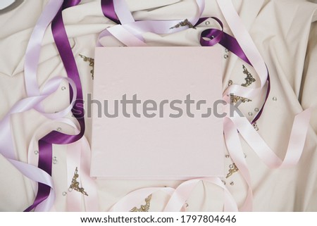 white book wrapped in leather on a white background. photo album from with a pure cover copy space. Greeting card