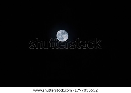 Very detailed moon in the sky on black background