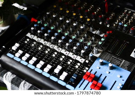 Professional audio mix sound control panel console / Sound technician and lights equipment