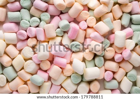 A pile of small colored puffy marshmallows.