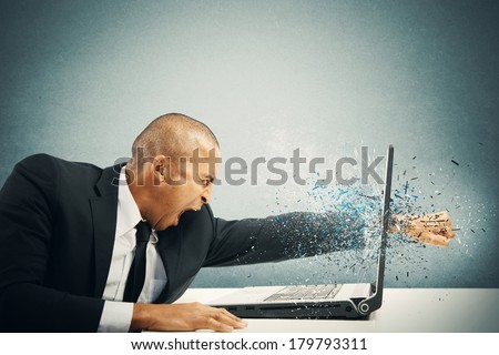 Concept of stress and frustration of a businessman with laptop Royalty-Free Stock Photo #179793311