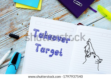 Financial concept meaning Takeover Target with inscription on the sheet. Royalty-Free Stock Photo #1797937540