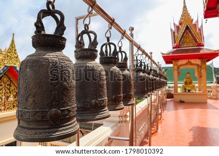  
A row of bells in a temple                              