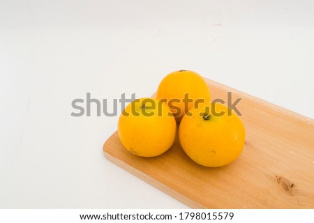Orange mandarins or tangerines isolated on white background.