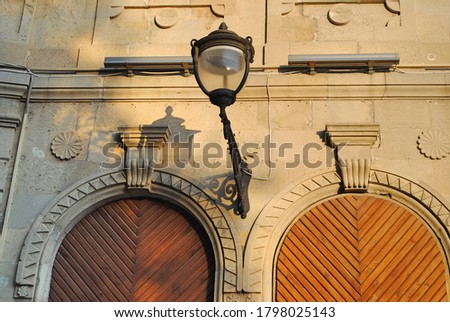 Symmetrical antique doors at the Walled City in Baku, UNESCO World Heritage Site. Azerbaijan