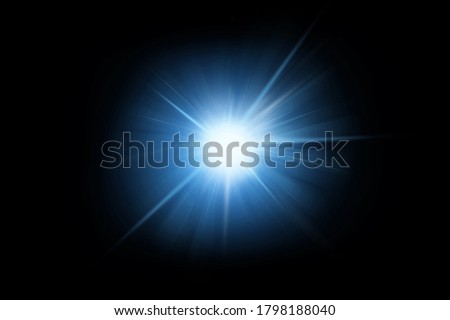 Light lens flare effects over black background.