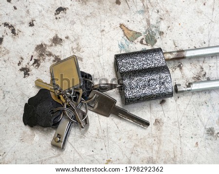 A bunch of key with key chain and padlock