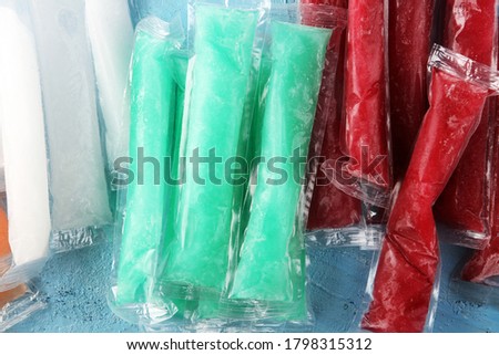 Colorful frozen fruit bar ice pops. Popsicle with fruit taste