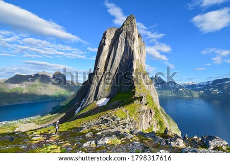Segla the most iconic peak of Norwegian Senja island, the most beautiful cliffed mountain above the arctic fjord. Located in Northern of Norway. Royalty-Free Stock Photo #1798317616