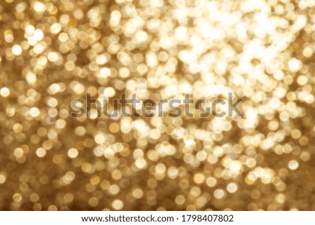 Bright round golden color light bokeh, vivid champagne color background