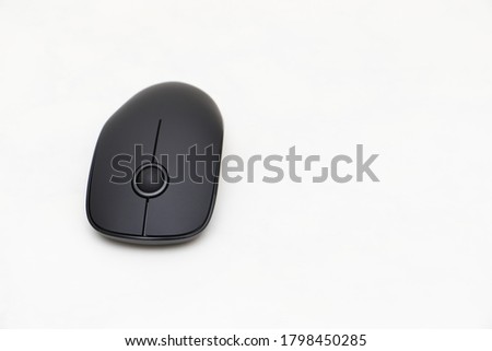 image of a black bluetooth wireless mouse on a white background
