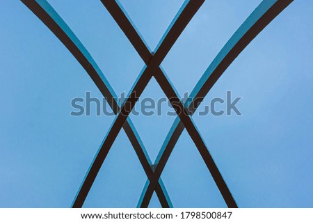 Beautiful abstract photo with blue background and iron structure.