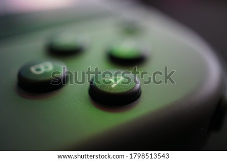 close up black game controller