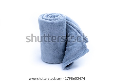 Comfort Rolled up grey coral fleece throw isolated on white background Royalty-Free Stock Photo #1798603474