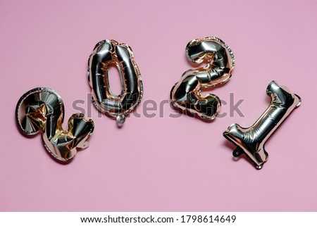 2021 golden foil balloons numbers,  Top horizontal view copy space new year and holiday concept.
