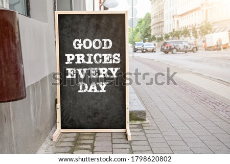GOOD PRICES EVERY DAY. Foldable advertising poster on the street