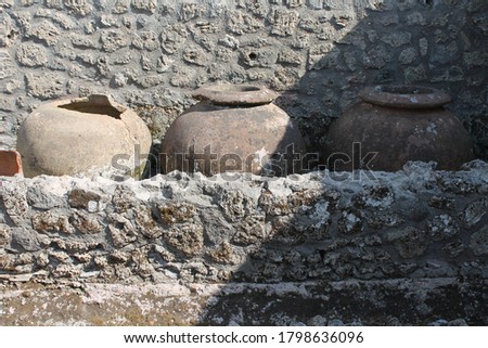 ancient house architecture found in the archaeological excavations of Pompeii, seat of so much tourism, you can see ancient amphorae   