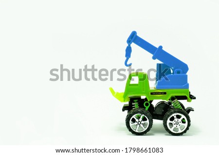 Toy crane truck isolated on white background