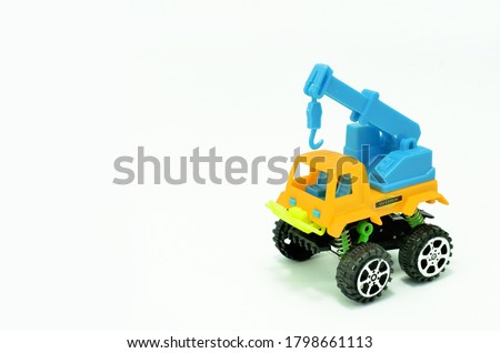 Toy crane truck isolated on white background