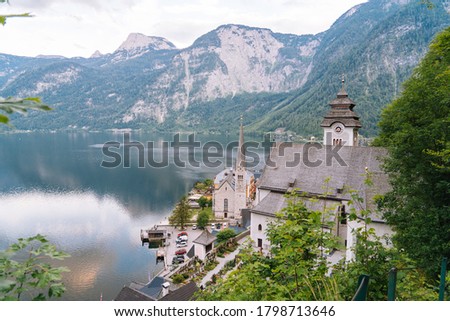Austria, Hallstatt UNESCO historical village. Scenic picture-postcard view of famous mountain village in Austrian Alps in Salzkammergut area at beautiful light in summer. Views over roofs of the lake.