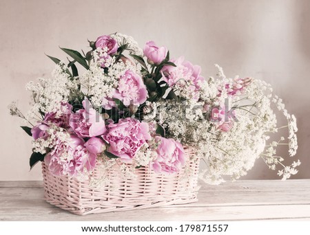 pink peony in basket
