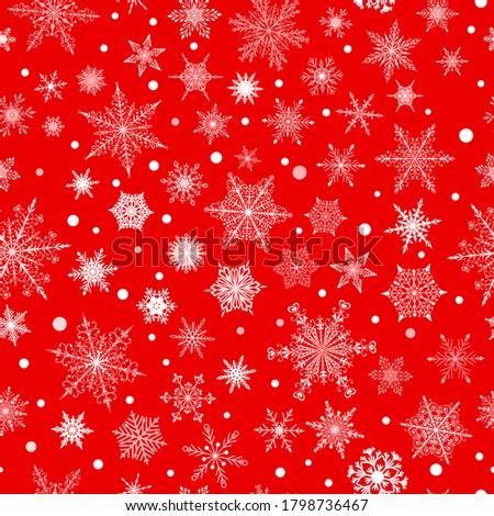 Christmas seamless pattern of various complex big and small snowflakes, white on red background