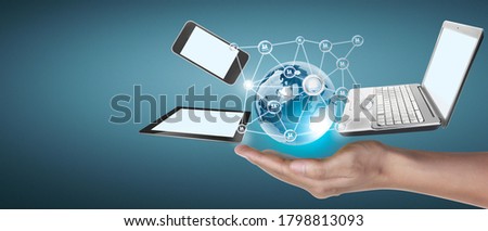 Technology tech devices connected to each other in the hands