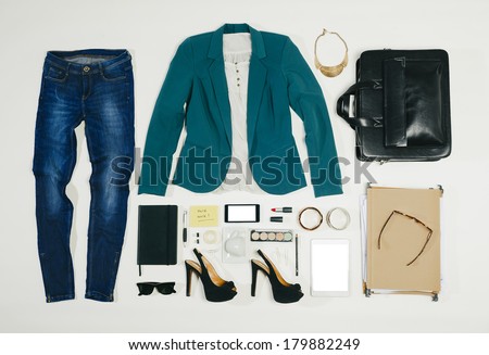 Outfit of clothes and woman accessories./ Overhead of essentials business woman.  Royalty-Free Stock Photo #179882249