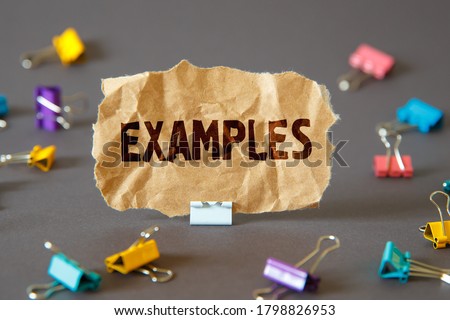 Text sign showing EXAMPLES. Concept foto, Role Model leadership, Explanation Royalty-Free Stock Photo #1798826953