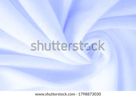 Blue cloth, abstract background of luxury fabric or liquid silk texture of waves or wavy folds. background or elegant wallpaper design. Cotton texture, natural fabric and dye, bright blue color
