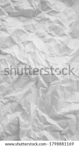 closeup to creased paper texture background
