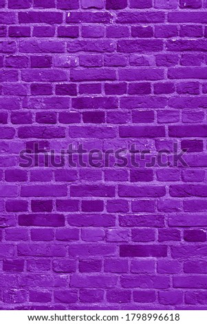 Violet brick building wall. Interior of a modern loft. Background for design 