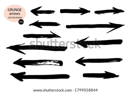 Collection of vector arrows.The drawn object of the brush.Arrows on a white background.Abstract hand-painted brush and stroke arrows.