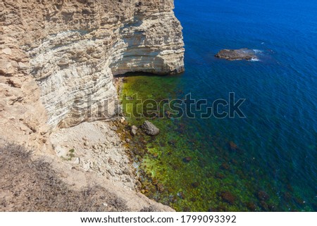 Seascape - Small lagoon surrounded by high cliffs