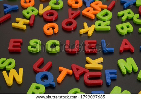 plastic letters forming the word school