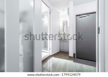 Pictures of the interior of a small suite that are divided into usage proportion