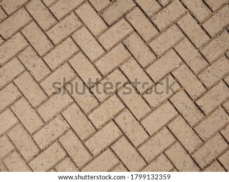 Photo of a concrete floor with its symmetrical designs