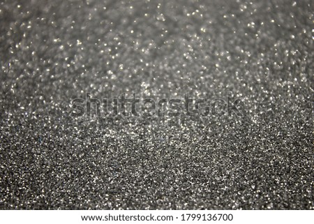 This is a photograph of Silver glitter holographic background
