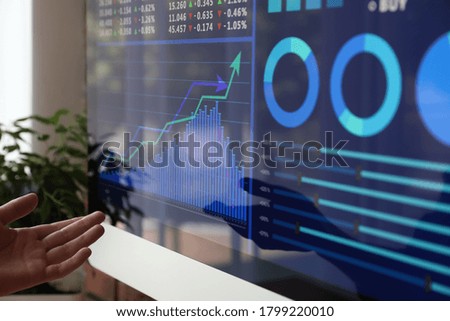 Woman working with modern computer indoors, closeup