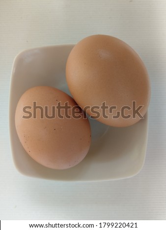 two chicken eggs close up picture