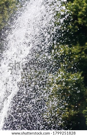 Close up of waterfall in the city pond