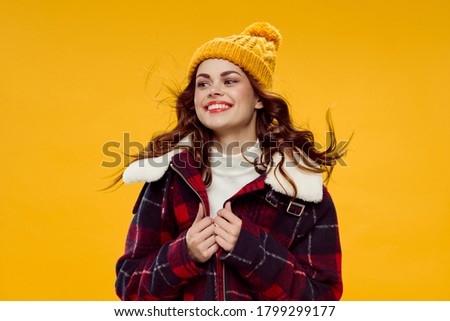 cheerful woman in trendy clothes fashion yellow hat lifestyle