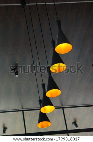 rows of beautiful decorative lights in the room