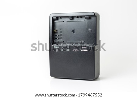 DSLR camera battery charger on white background
