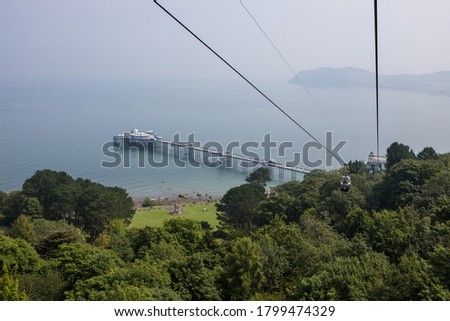 View of Llandudno pier and the little Orme from the cable cars on the great orme. North Wales tourist destination
