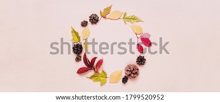 Banner with round frame of leaves in pastel colors for your design.
